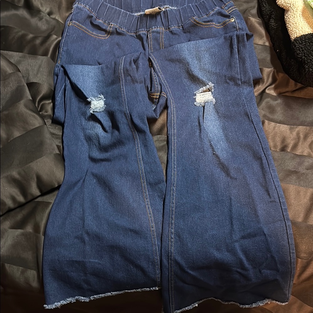 Women's Distressed Blue Jeans